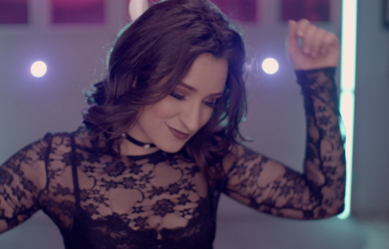 Screenshot from the music video 'Free' of Nicole Haber